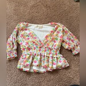 Floral V-Neck Blouse with Ruffle Hem